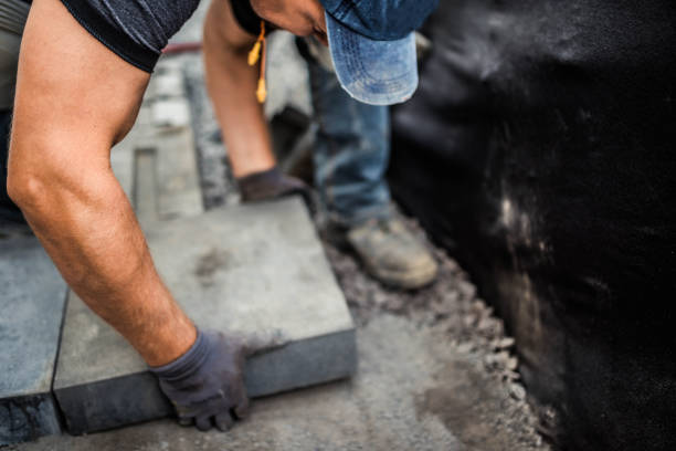 Transforming Outdoor Spaces: Concrete Patios & Retaining Walls